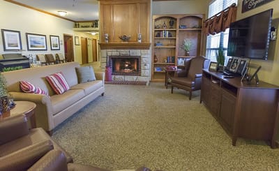 Cozy common area with seating and fireplace