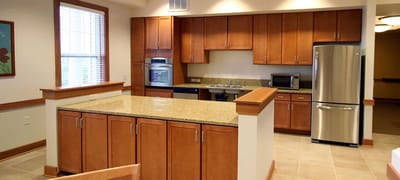Bright and modern kitchen interior with cabinets