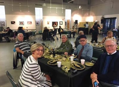 Residents enjoying a party in a common area