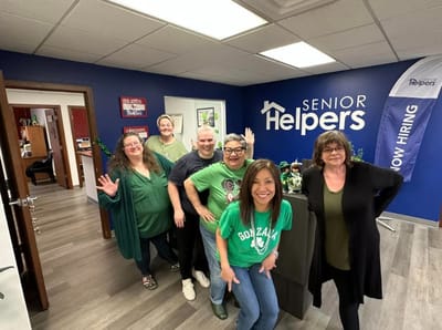Staff members posing in the facility office