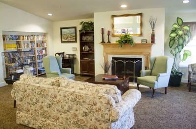 Cozy common area with seating and a fireplace