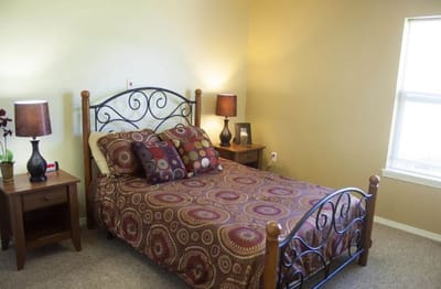Cozy bedroom with a bed and decorative pillows