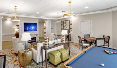 Interior lounge area with pool table and seating