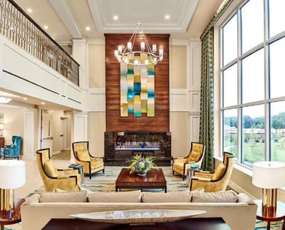 Bright and elegant common area with seating and artwork