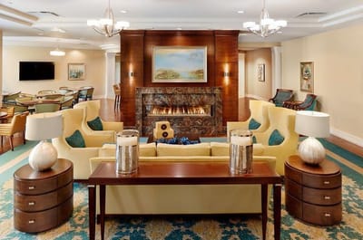 Common area with seating and a fireplace