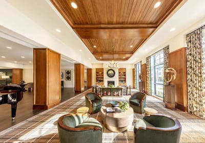 Bright interior common area with seating and decor