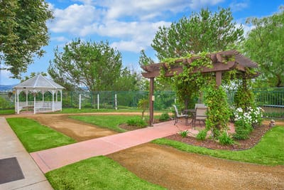 Outdoor garden area with gazebo and walking path