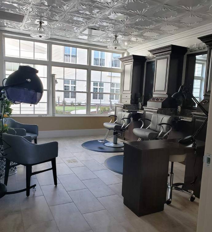 Interior of a beauty salon with salon chairs and lighting