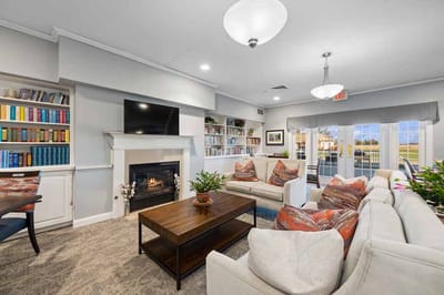 Cozy common area with seating and fireplace