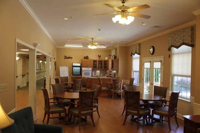 Interior of a common area with tables and chairs