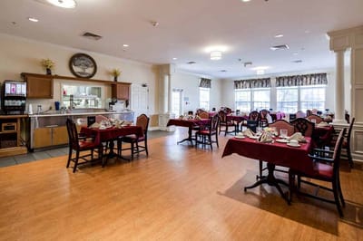 Dining room with tables set for a meal
