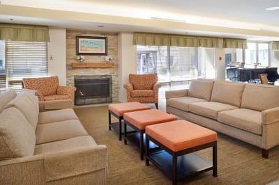 Cozy common area with seating and a fireplace