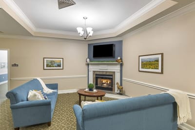 Cozy interior lounge area with a fireplace