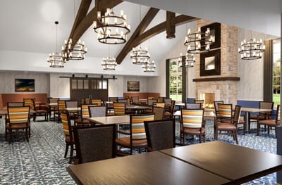 Bright dining area with elegant lighting and decor