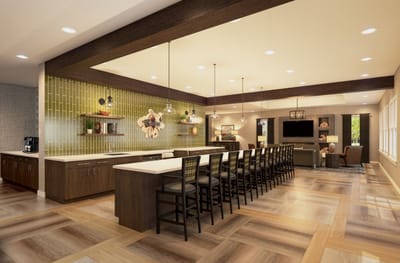 Modern dining area with seating and natural light.