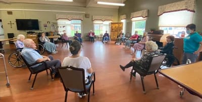 Residents participating in an activity session in the common area