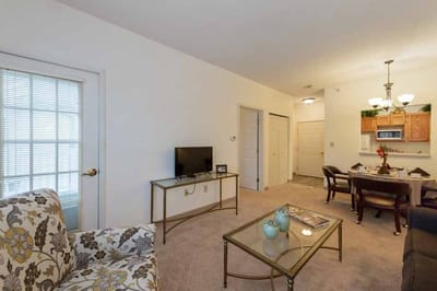 Cozy interior of a resident room with a television and dining area