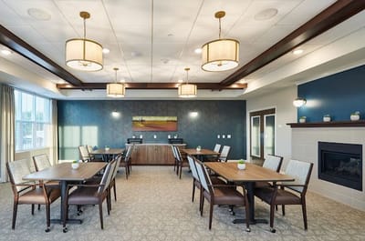 Bright common area with tables and chairs