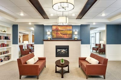 Interior view of a cozy common area with seating