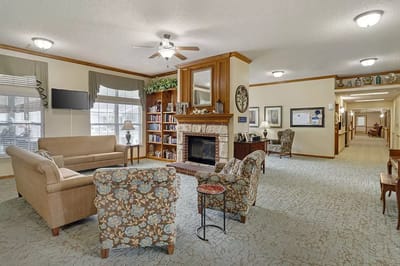 Cozy common area with seating and a fireplace