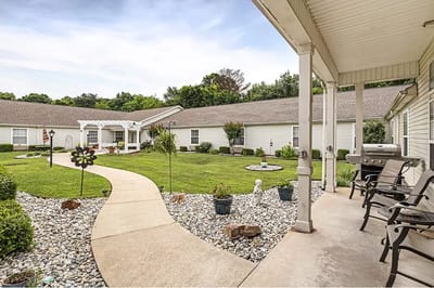 Well-maintained outdoor space with garden paths and seating