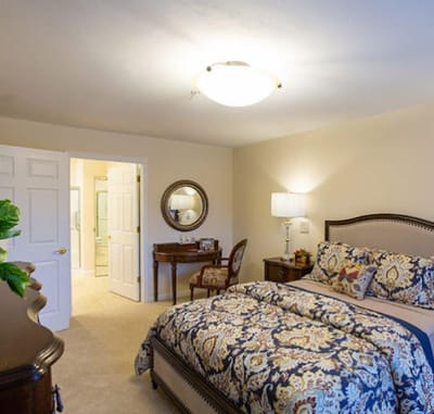 Cozy bedroom with elegant decor and attached bathroom