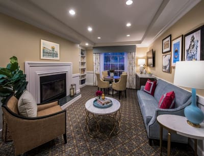 Cozy common area with seating and artwork
