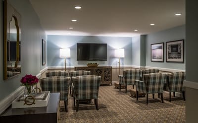 Interior common area with seating and TV