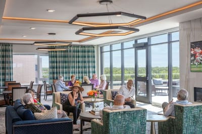 Residents socializing in a bright common area