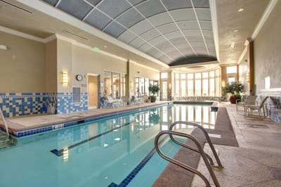 Indoor swimming pool area with natural light