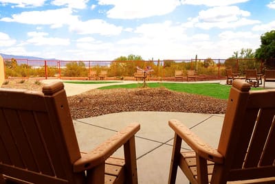 View of outdoor seating area with a scenic backdrop