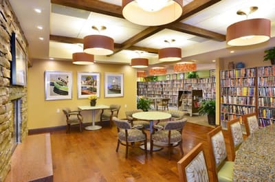 Common area with bookshelves and seating