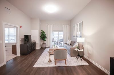 A cozy interior of a living room in a senior facility