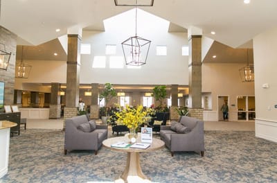 Bright and welcoming lobby area with seating and decor