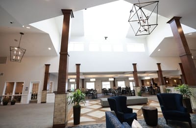Bright and spacious common area with dining