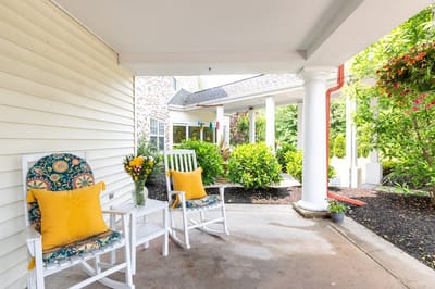 Charming outdoor seating area with floral decor