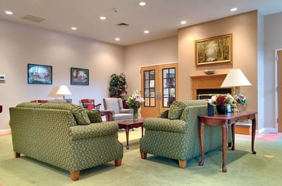 Cozy interior common area with seating and art