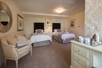 A well-furnished resident room in a facility