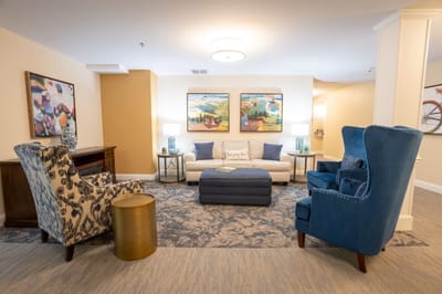 Cozy common area with seating and artwork