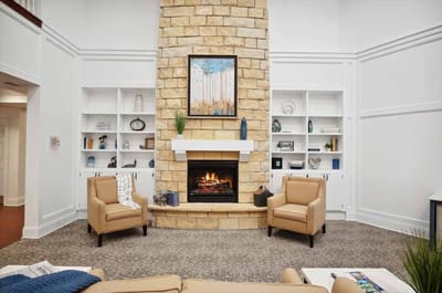 Cozy common area with a fireplace and seating