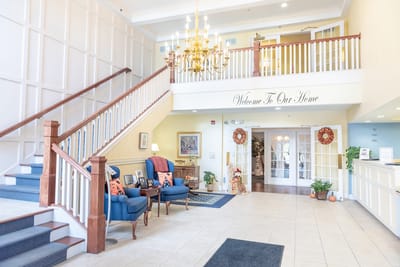 Bright lobby area with seating and welcoming decor