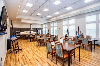 Bright common area with tables and chairs
