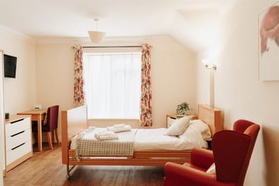 Cozy resident room with comfortable furnishings