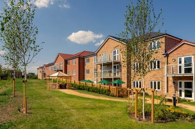 Exterior view of Bluebell House with outdoor space.