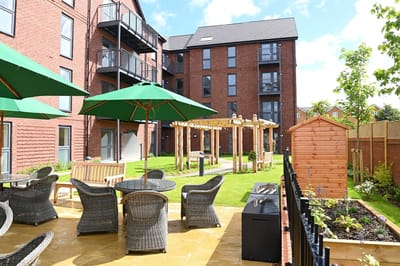 Outdoor space with seating and greenery