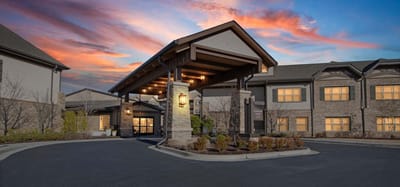 Entrance with covered awning and beautiful sunset