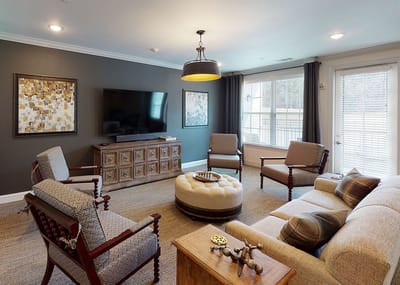 Cozy common area with seating and television