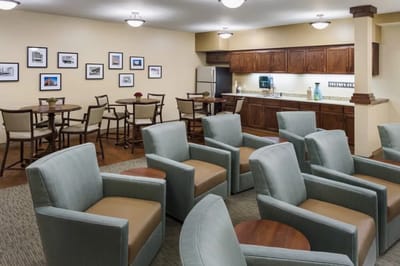 Common area with seating and dining setup