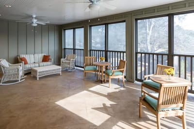 Bright common area with seating and tables