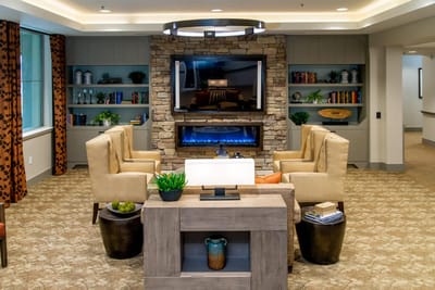 Cozy common area with seating and fireplace